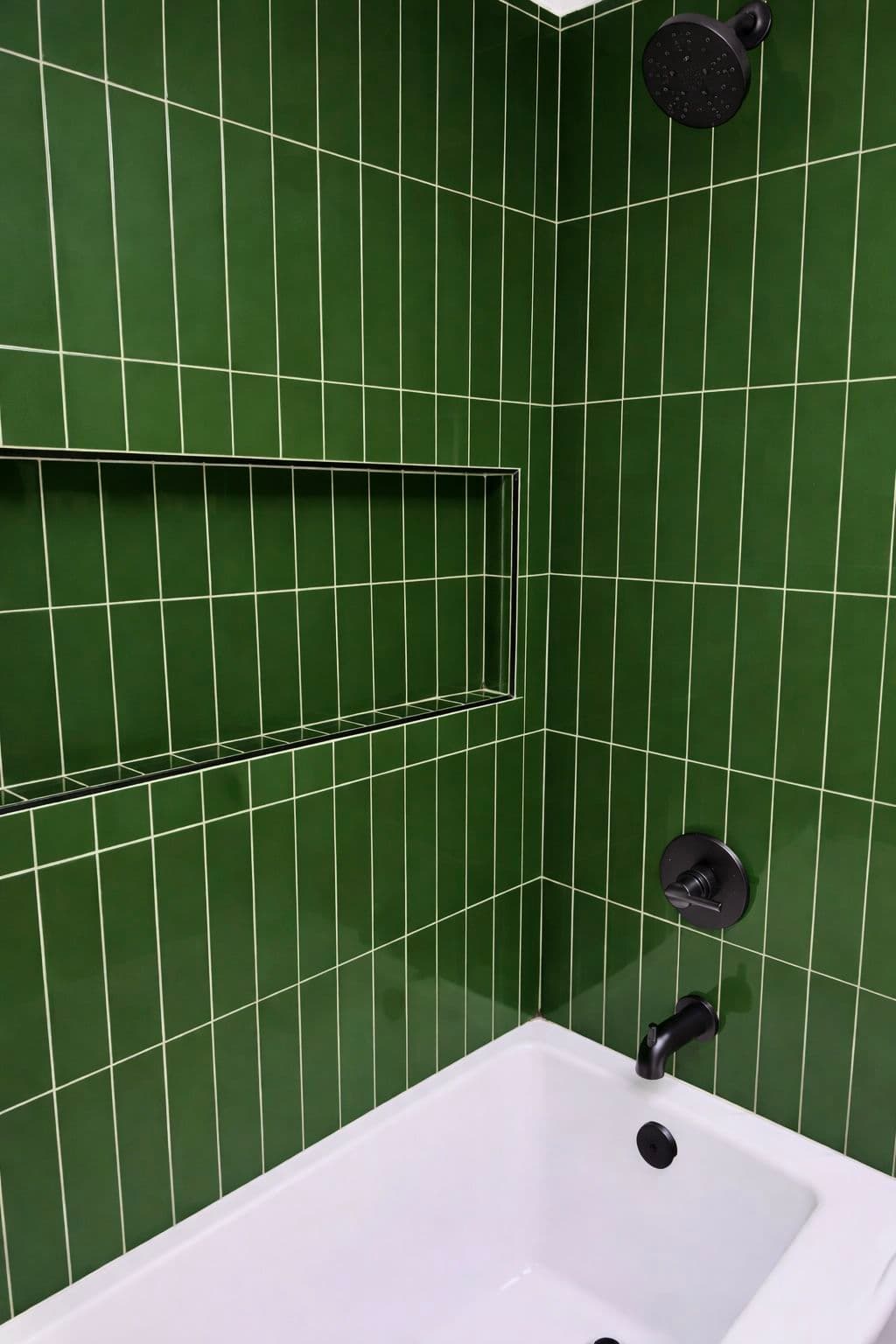 Elegant Bathroom Makeover with Chic Green Tiles