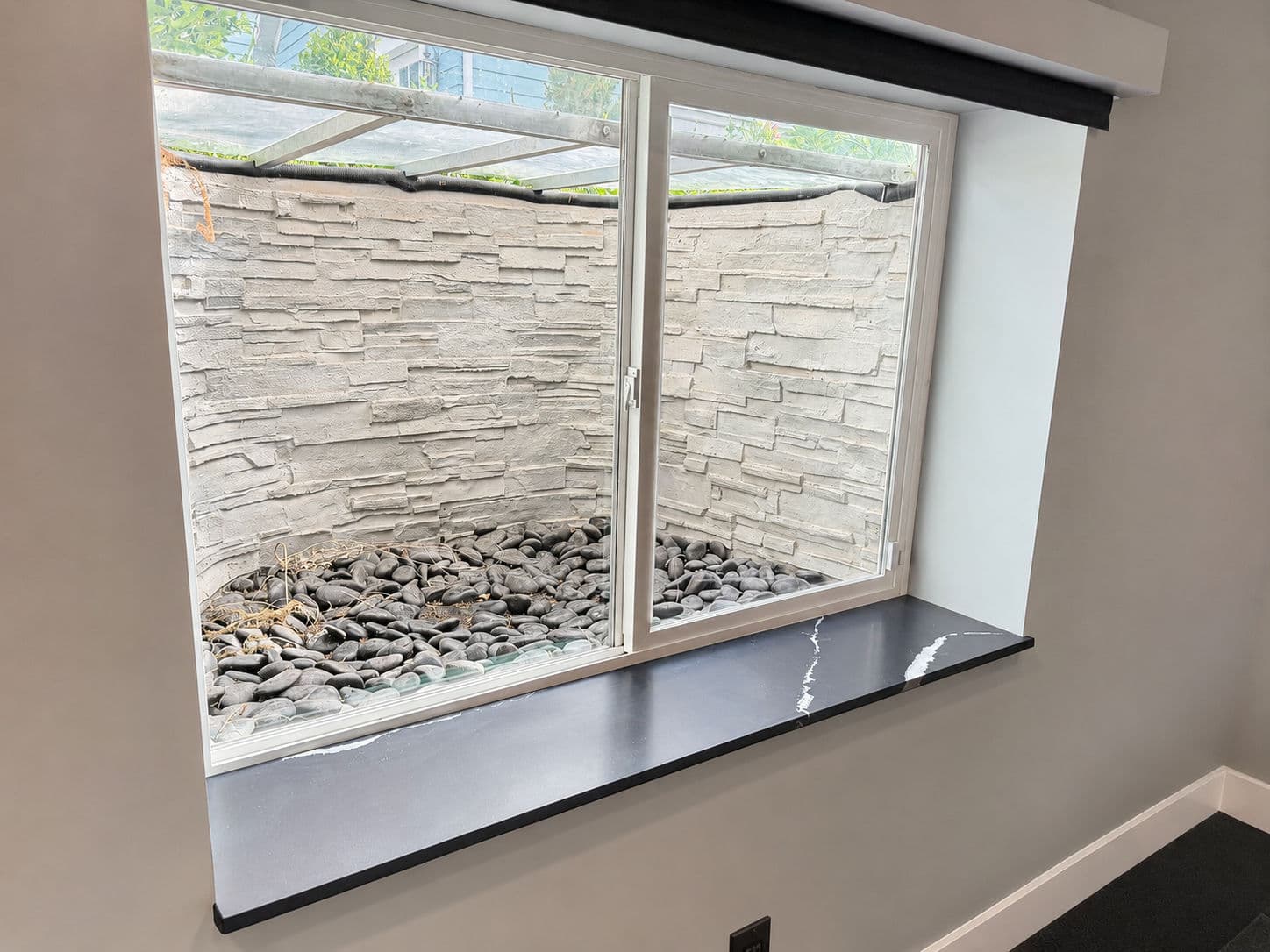 Finished Window Ledge Detail That Makes a Basement Bar Feel Complete image