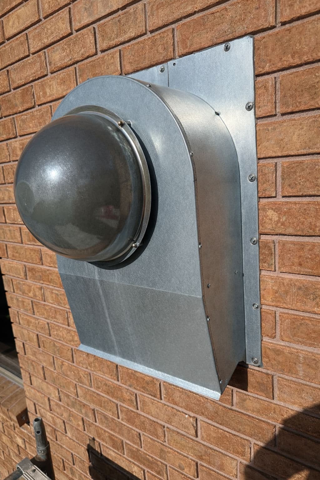 Project Precision Hood Vent Installation in Solid Brick image