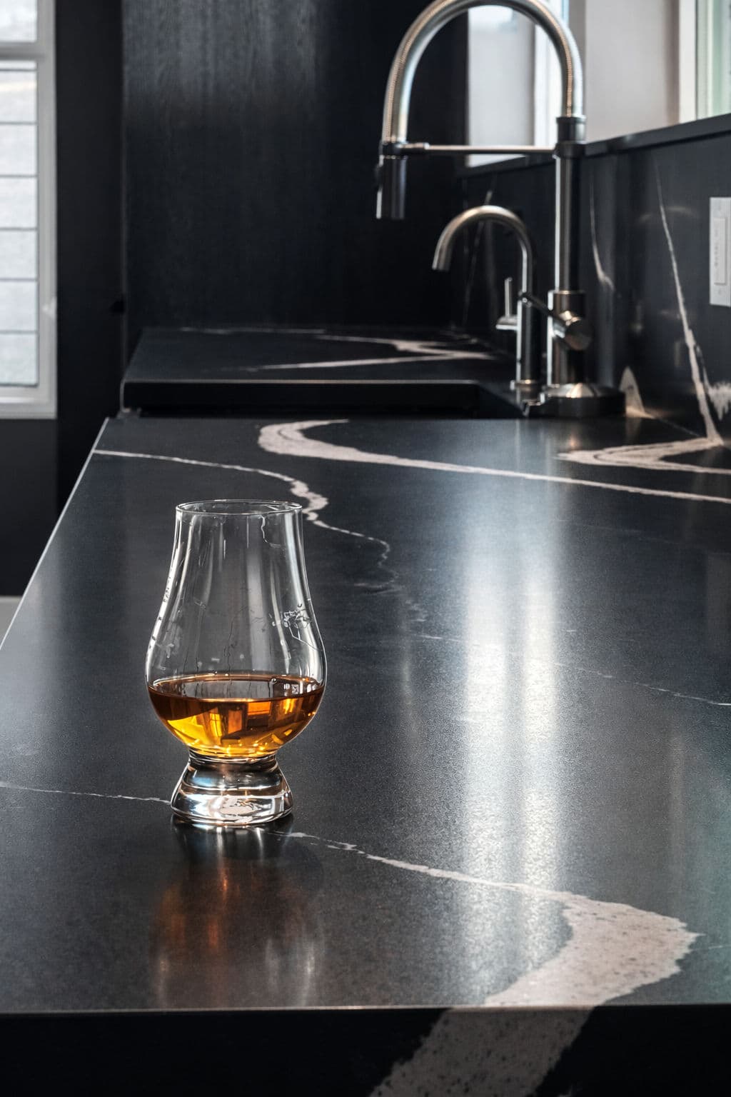 Sleek Black Countertops for Versatile Living