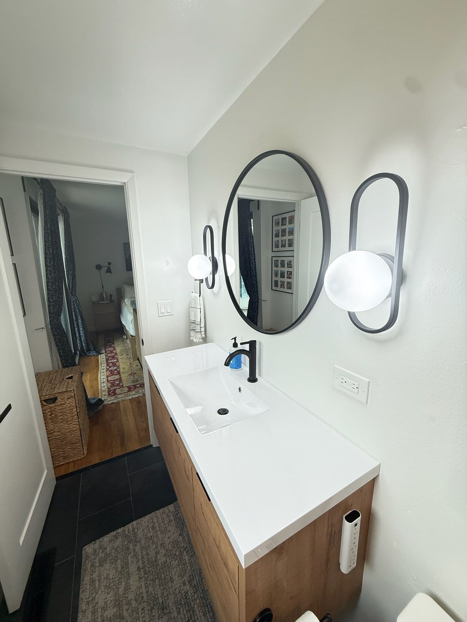 Elegant Master Bathroom Transformation with Space-Saving Design image