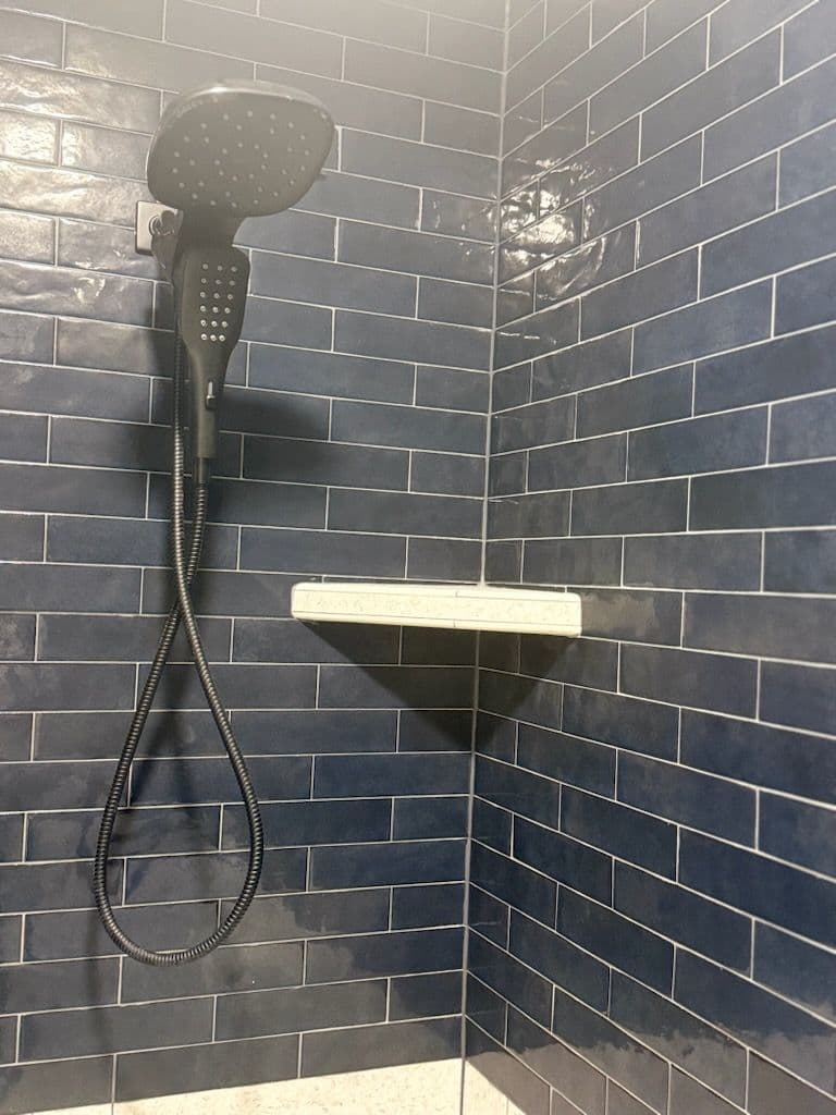 Gallery photos for Modern Shower Renovation with Blue Subway Tiles: Image #2
