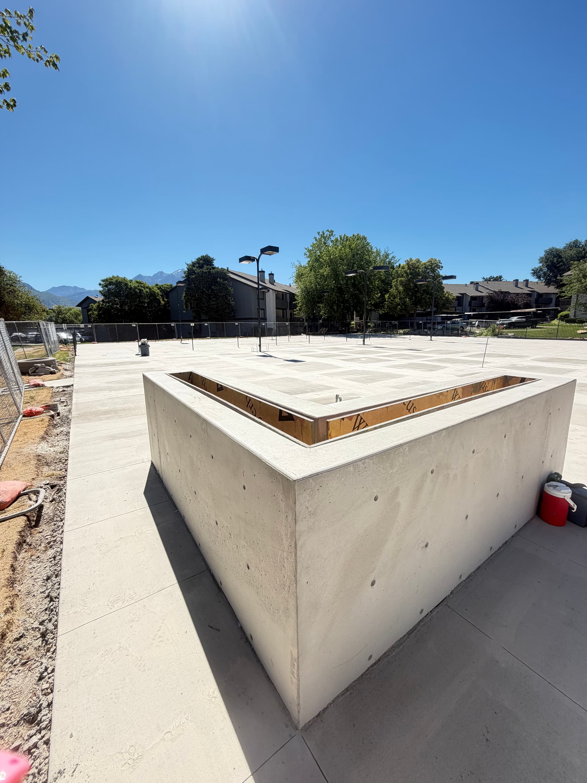 Concrete Poured and Curing on This Outdoor Living Build image
