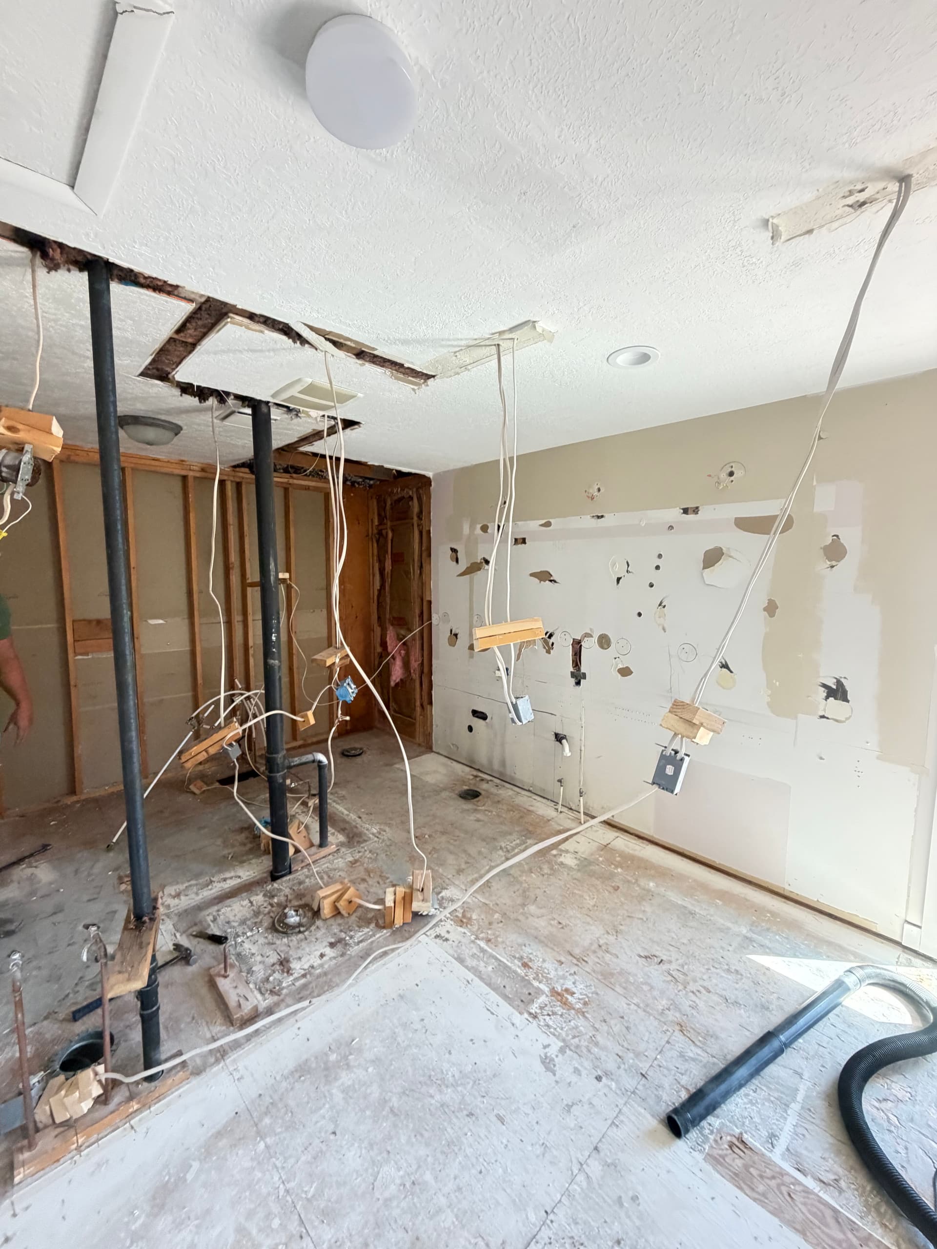 Turning 2 Awkward Bathrooms Into Luxury Spaces From the Ground Up image